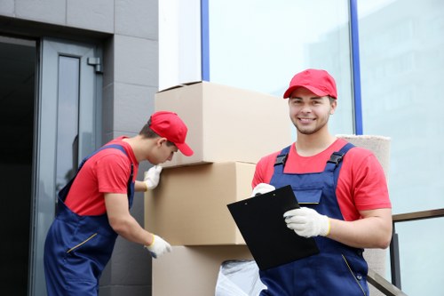 Loading household items into a van for an Uxbridge move