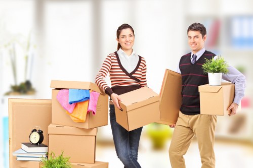 Office relocation planning in Uxbridge with moving boxes and workspace setup