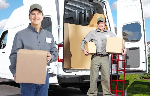 Local removal van loading boxes for a home move in Uxbridge