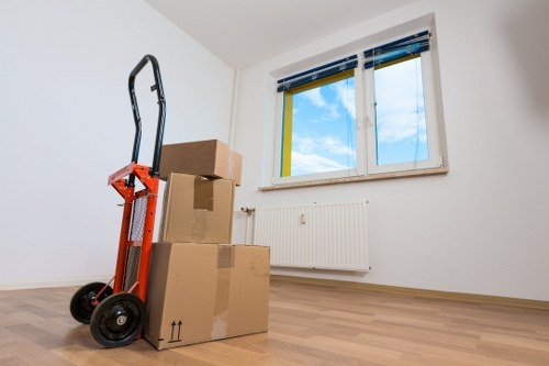 Removal van loading near a residential street in Uxbridge