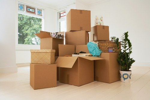 Packed moving boxes and furniture prepared for removal in Uxbridge