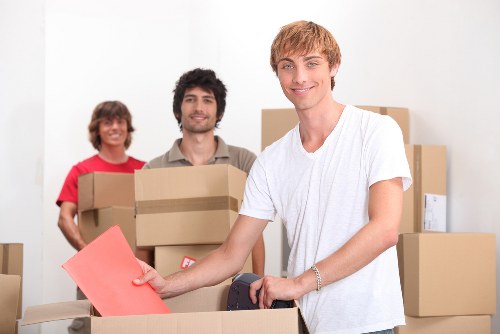Local commercial movers loading stock and furniture for a Uxbridge business move