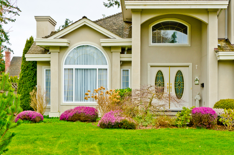 Movers carrying furniture through a Uxbridge home with care
